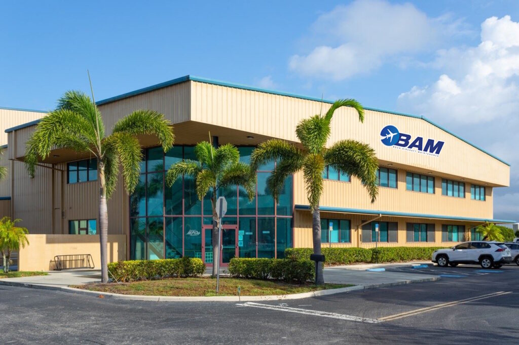 front of building with BAM logo
